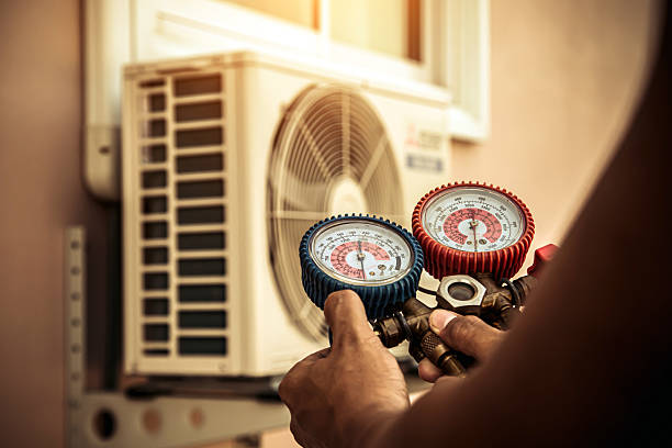 Professional Air Conditioning Service technician working in Pierce, CO
